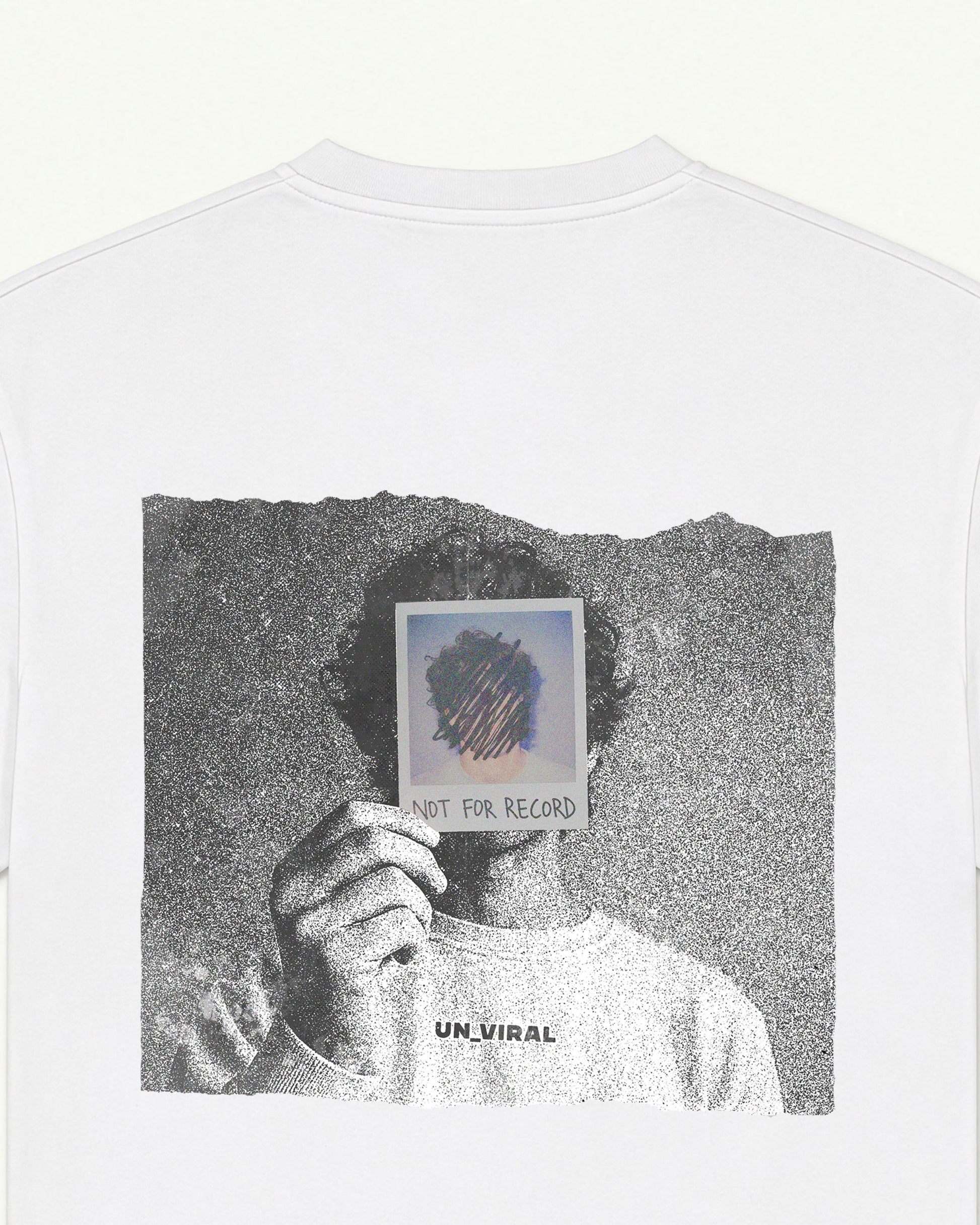 Close-up of the Not For Record back print on a white oversized UNVIRAL tee, halftone photography detail