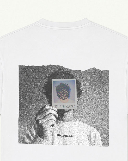 Close-up of the Not For Record back print on a white oversized UNVIRAL tee, halftone photography detail