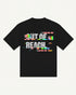 Out of Reach black oversized tee with glitch typographic back print, back