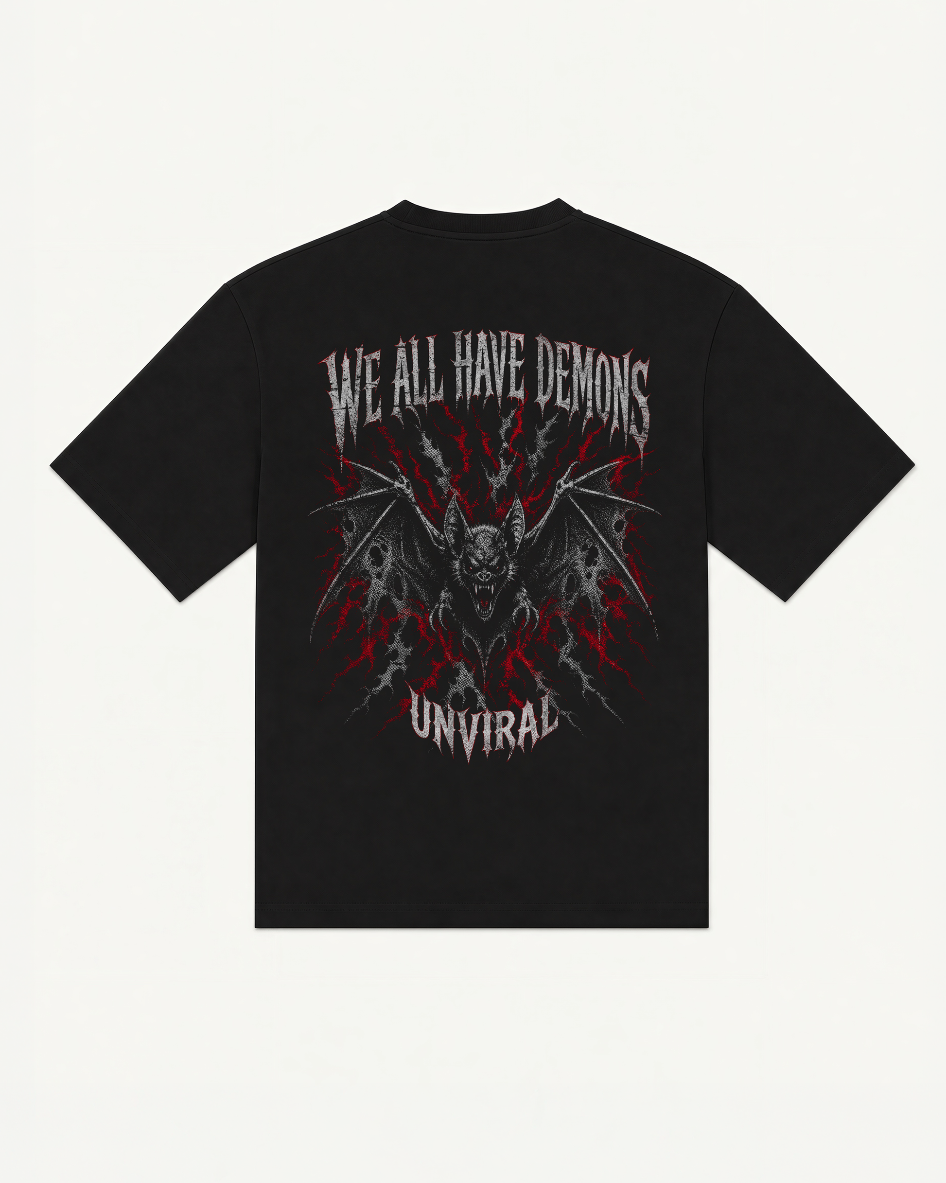 Black oversized UNVIRAL t-shirt with a gothic bat illustration and We All Have Demons back print