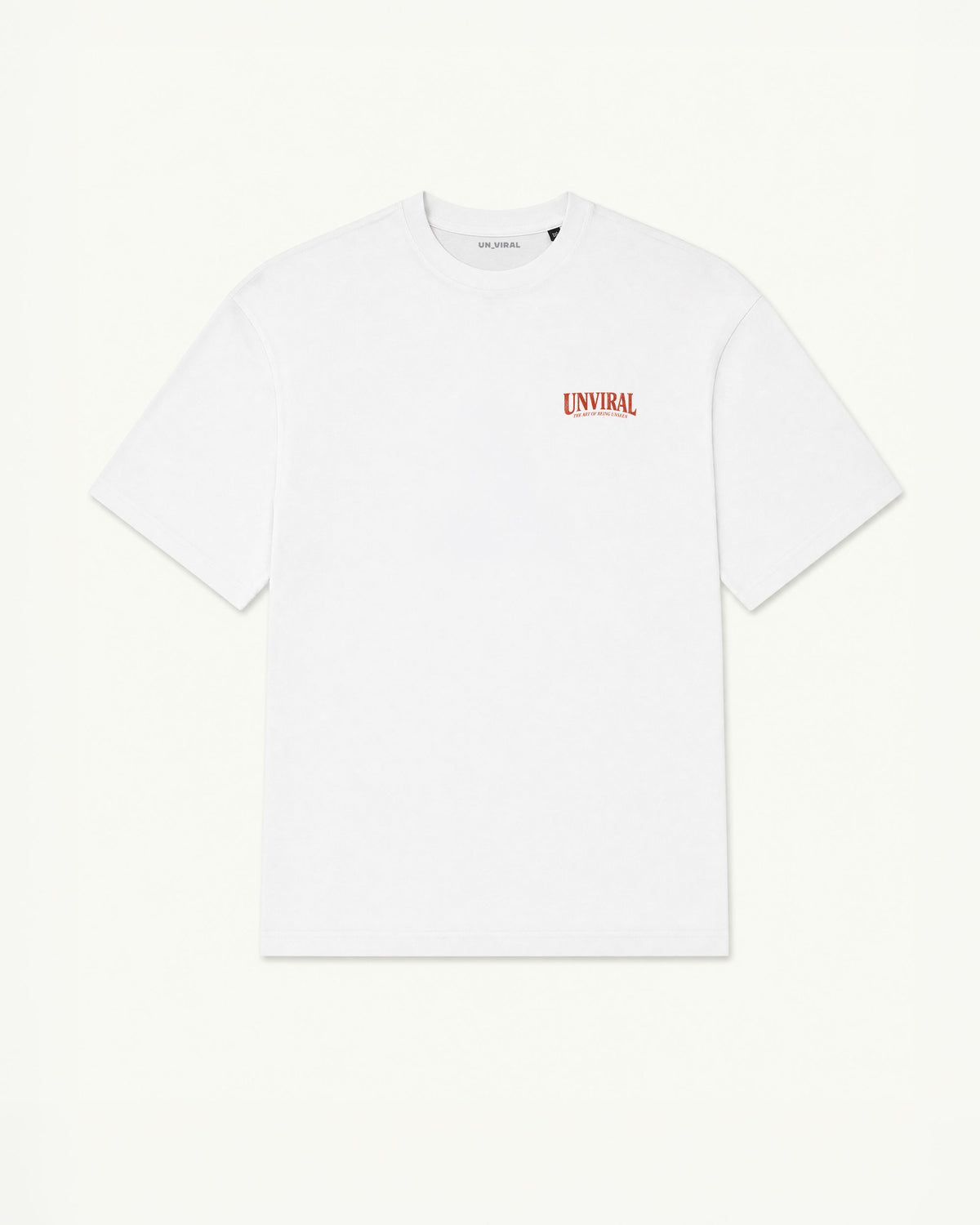 The Art of Being Unseen white oversized tee worn on model