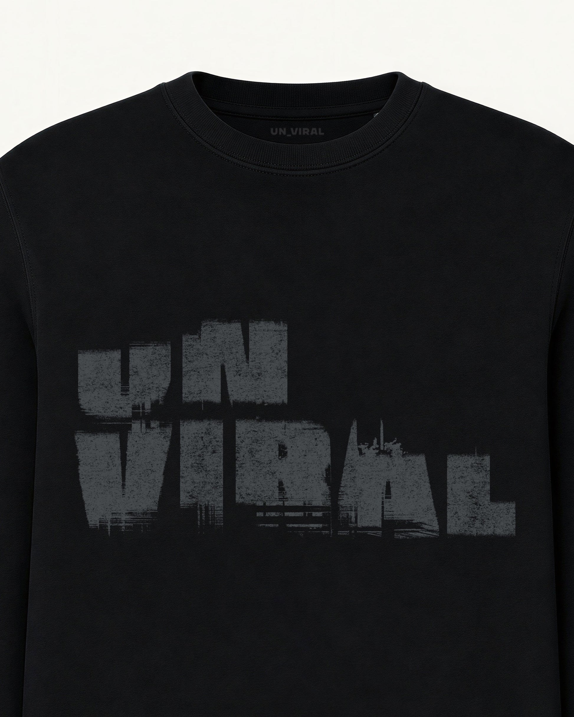 Signal Decay UNVIRAL black crewneck sweatshirt with decayed wordmark graphic, front