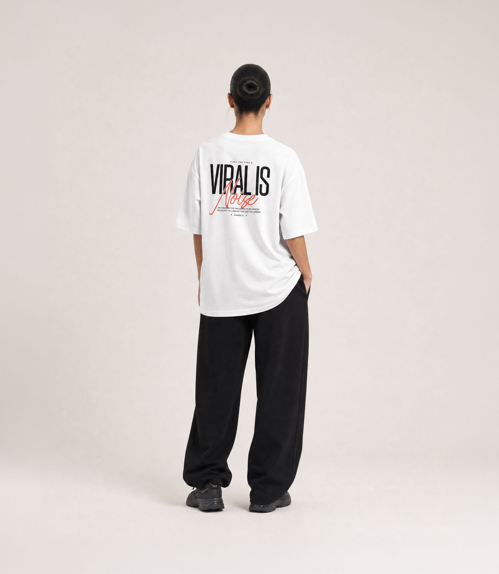 Viral Is Noise white tee worn, oversized fit
