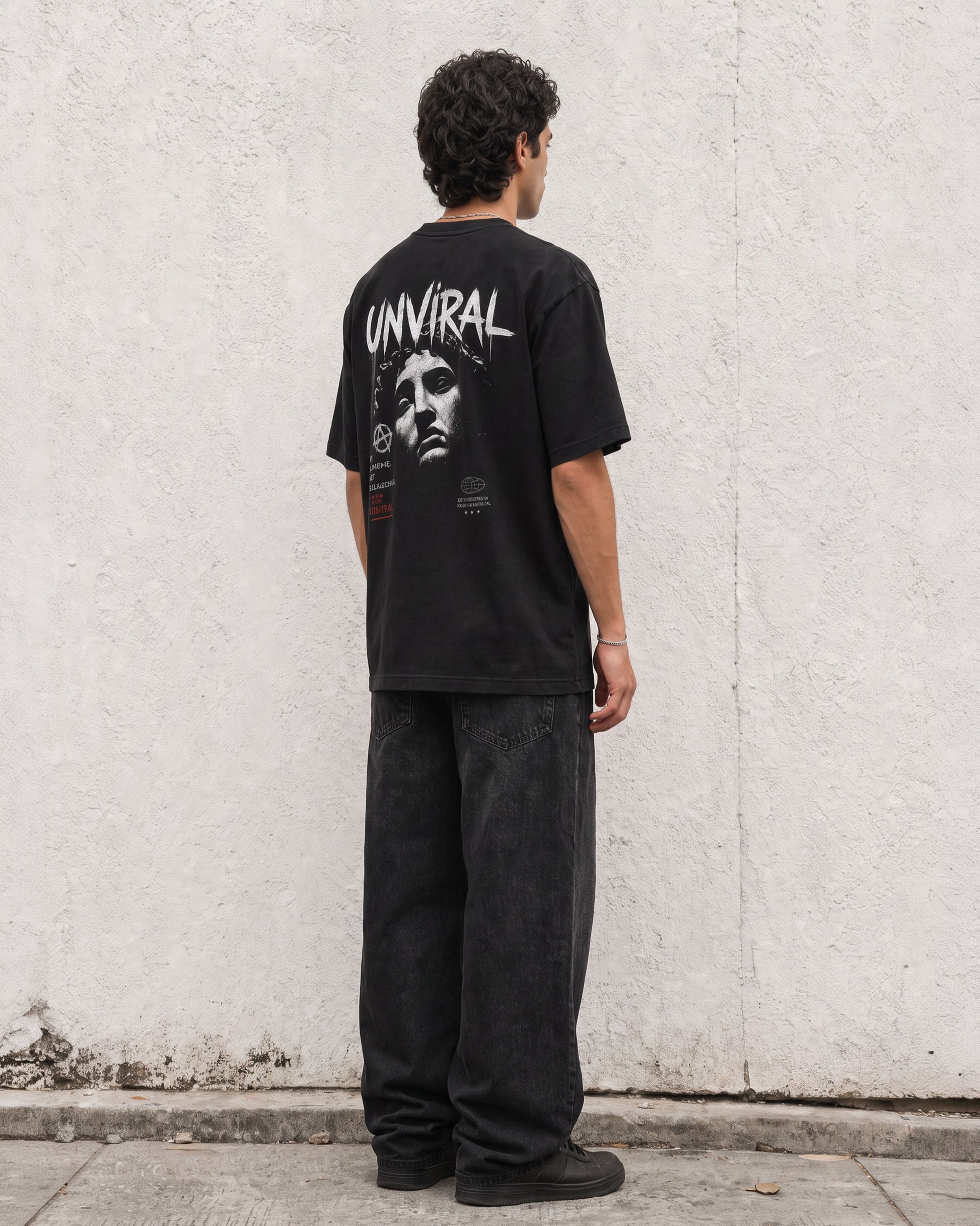 Made to Disrupt black oversized t-shirt worn on model, back print detail