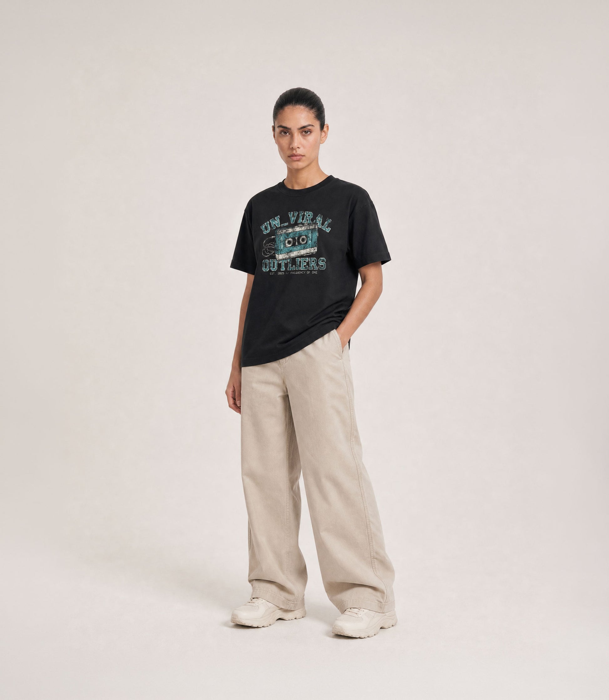 Side A washed black tee worn, oversized fit